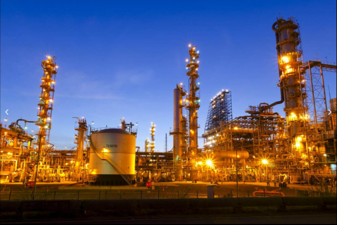 Oil refinery at dusk